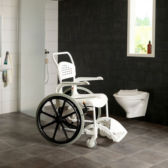 Etac Clean Self Propelled Shower Commode Chair in bathroom