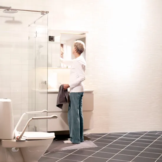 Etac Hi-Loo Toilet Seat in bathroom