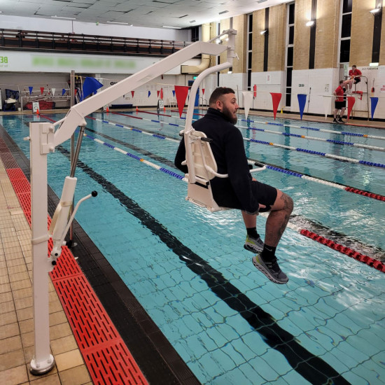 Oxford Dipper Pool hoist with Ranger Seat by pool 