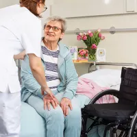 ROHO Mosaic Air Cell Wheelchair Cushion for Everyday Comfort - patient with worker