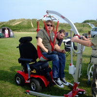 Molift Smart 150 hoist on the beach Molift Smart 150 hoist on the beach