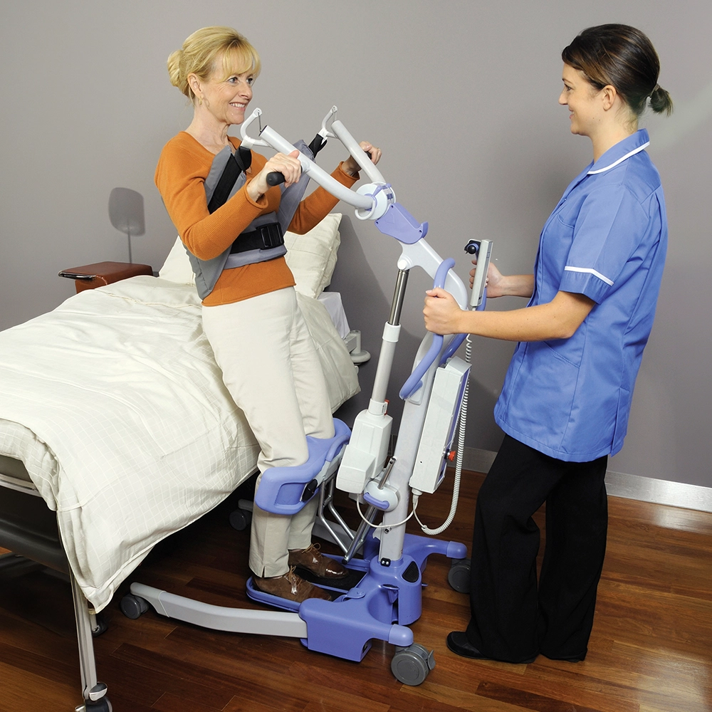 Care worker using a patient hoist, with the care provider responsible for LOLER compliance