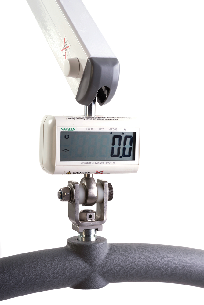 Digital scale for weighing patients placed in a sling suspended from a  ceiling lift or mobile lifter